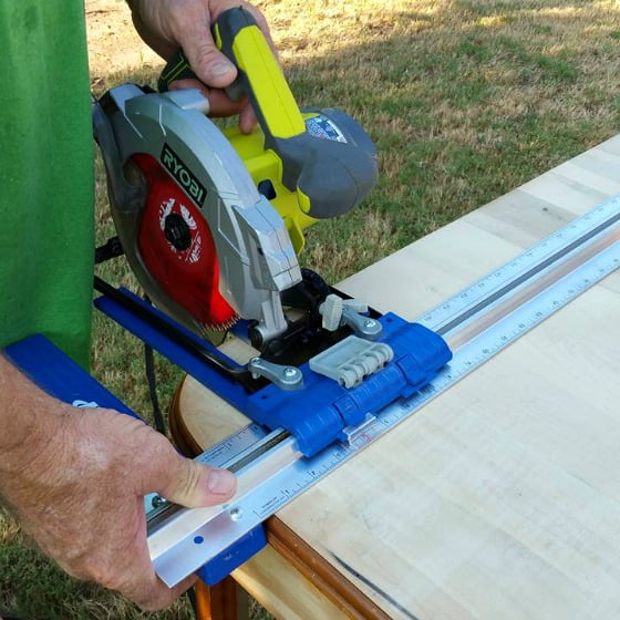 After removing all the veneer, I took my saw and cut grooves in the wood to create a faux plank table top on this farmhouse kitchen table.