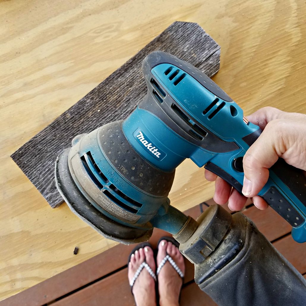 Sanding the rough wood for beautiful wooden tags. #woodentags