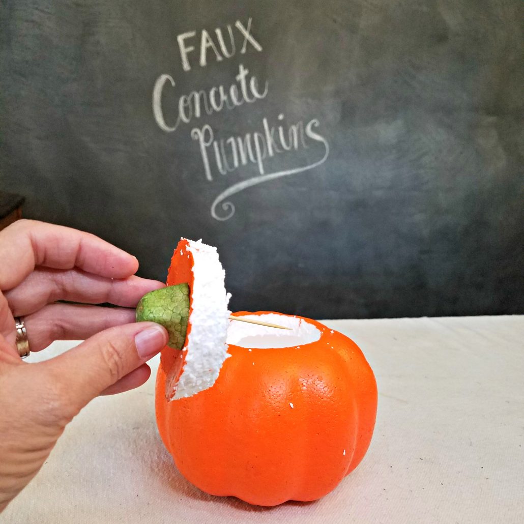 I started my Dollar Tree pumpkin makeover by cutting out the top.