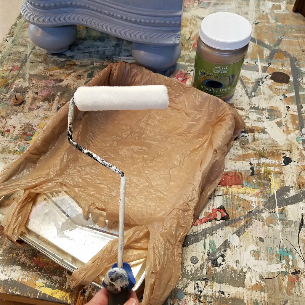 When using metallic paint on furniture, I like to roll it on first.