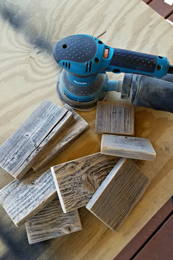 After sanding weathered fence pickets, you get this amazing wood and gray perfection that only time can give. These wooden Pumpkins are going to look amazing.