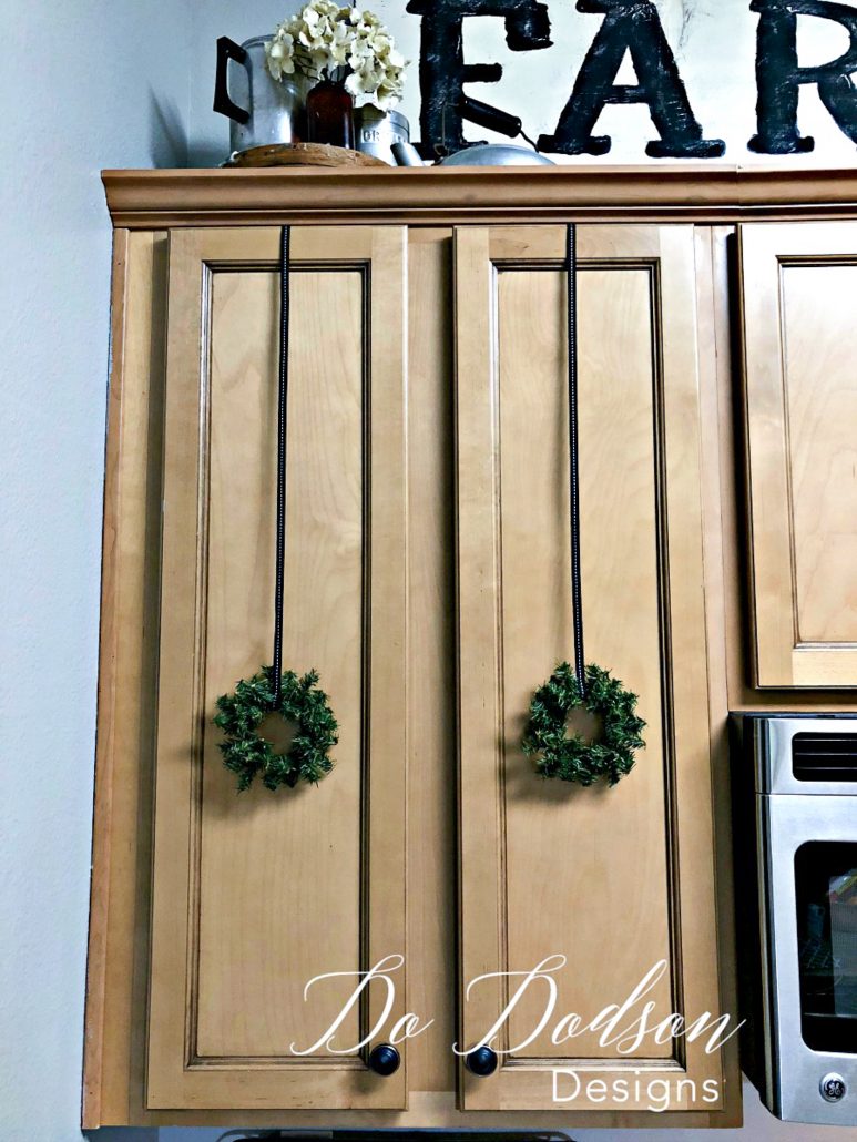 I used mini wreaths on my kitchen cabinets for Christmas.