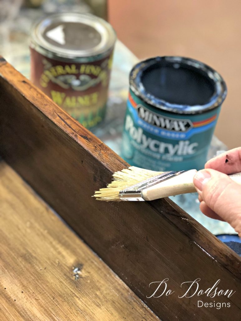 I applied a thin coat of the polycrylic to seal the water based stain on my decorative shelves.