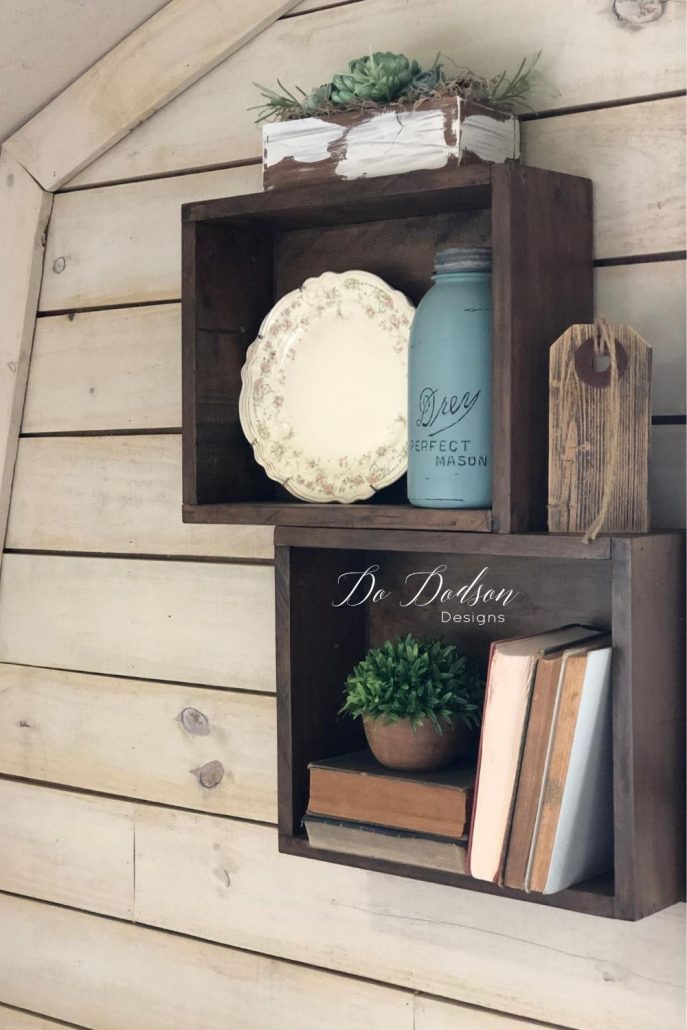 Vintage wooden crates make great decorative shelves for any space.