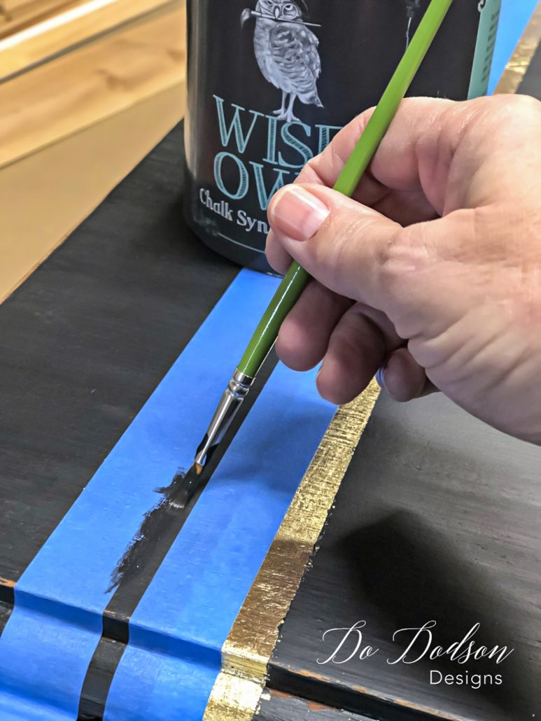 How to paint stripes on furniture like a pro.