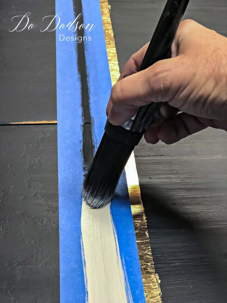 How to paint stripes on furniture like a pro and without bleeding.