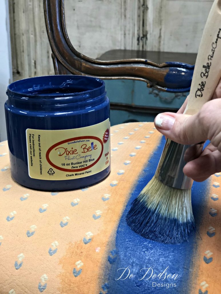 Painting fabric is best done with a darker color than the fabric. The darker pigments give better coverage on the fabric.