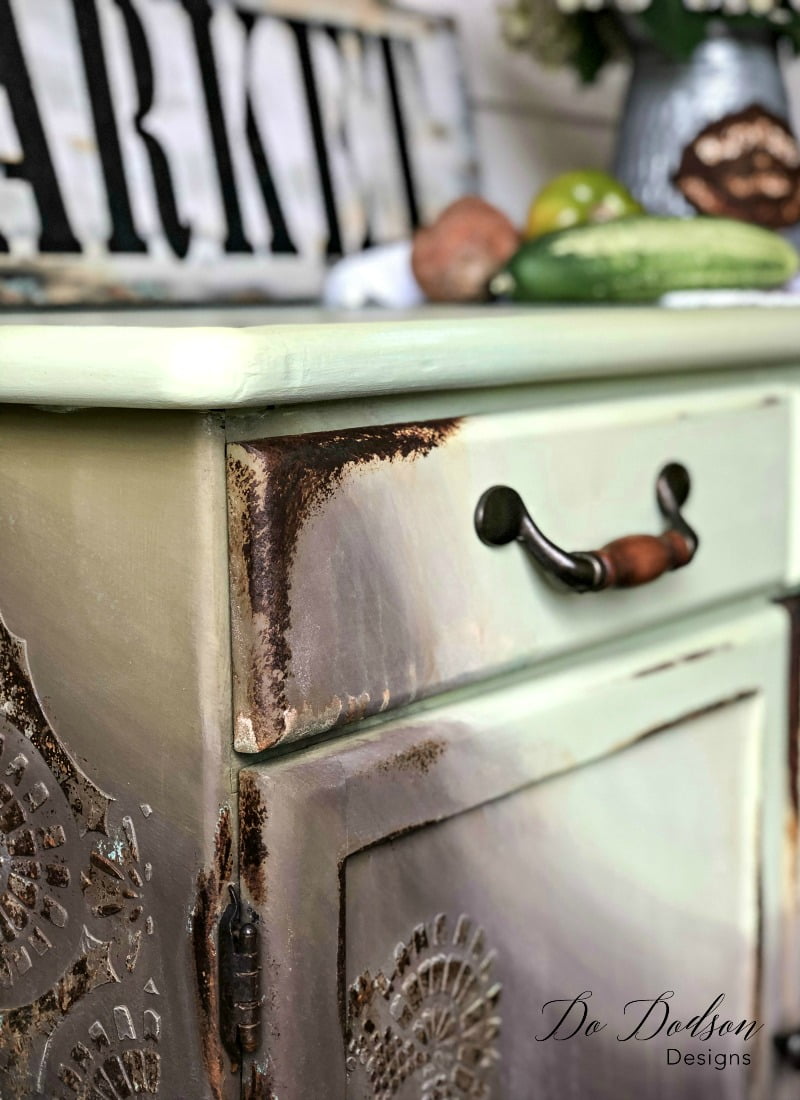 Adding rust paint to the raised stenciling really brought attention to the details.