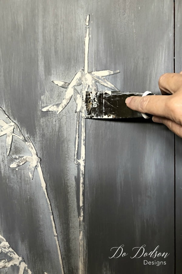 I applied a third color over the mother of pearl furniture inlay with a lighter color to create highlights. #furnitureartist #dododsondesigns #paintedfurniture #furnituremakeover #diyproject #diyhomedecor #motherofpearl