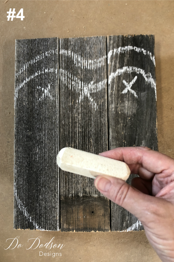 The 4th step in making DIY wood pumpkins is to mark your pattern with a piece of chalk. It doesn't have to be perfect. Just eyeball it.