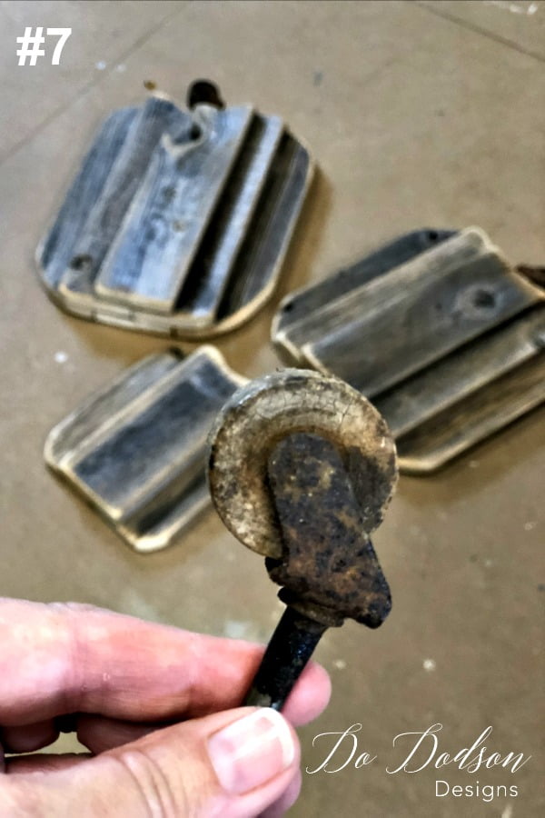 The #7 step in making DIY wood pumpkins is to find something that can be used as a stem. I had these leftover vintage wooden rollers from a furniture project and I liked the way these looked. All rusty and crusty!