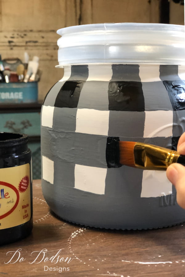 I completed the look of the buffalo plaid design by painting the center stripes that overlapped with black.