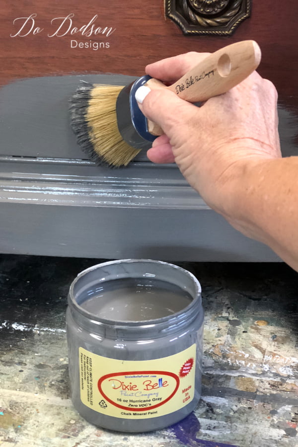 Painting the base coat with Hurricane Gray with the first step in the layered paint process to get the old world finish.