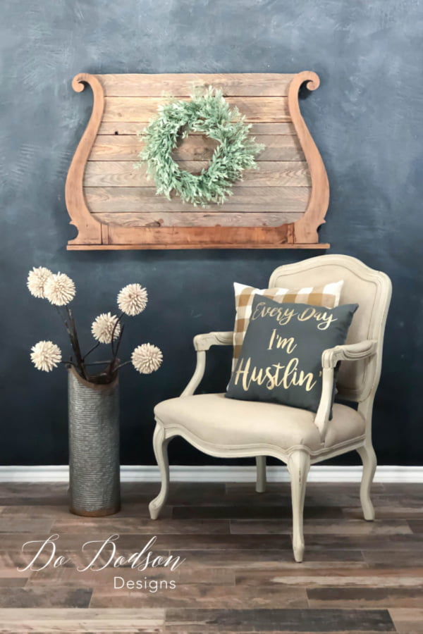 Pallet recycling and an antique mirror harp are a beautiful combination when combined.