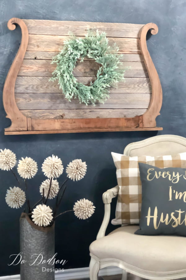 This was the pallet recycling idea I ever had. I repurposed a mirror harp and added old pallet wood to create a stunning wall display.