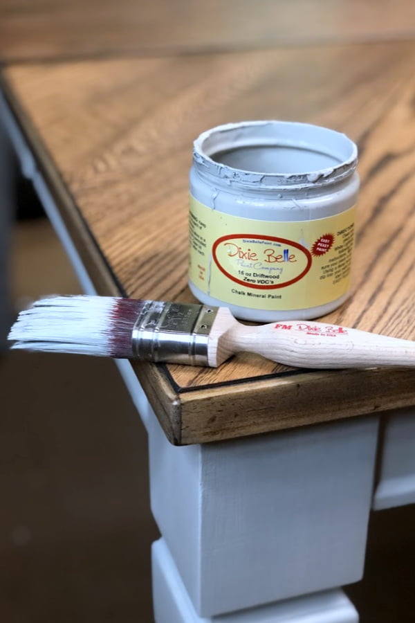 I used a beautiful color called Driftwood by Dixie Belle to paint the base of this farm table.