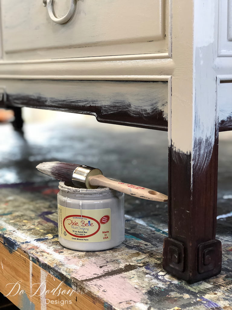 The first step in creating a denim painted look on furniture is to paint a lighter color on the top 2/3 of the piece.