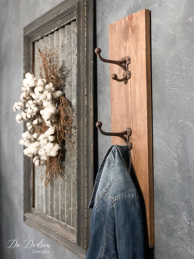 I made a quick and easy wall coat hanger with just one board! My space was small and I only needed just a couple of hooks. This was the perfect solution.
