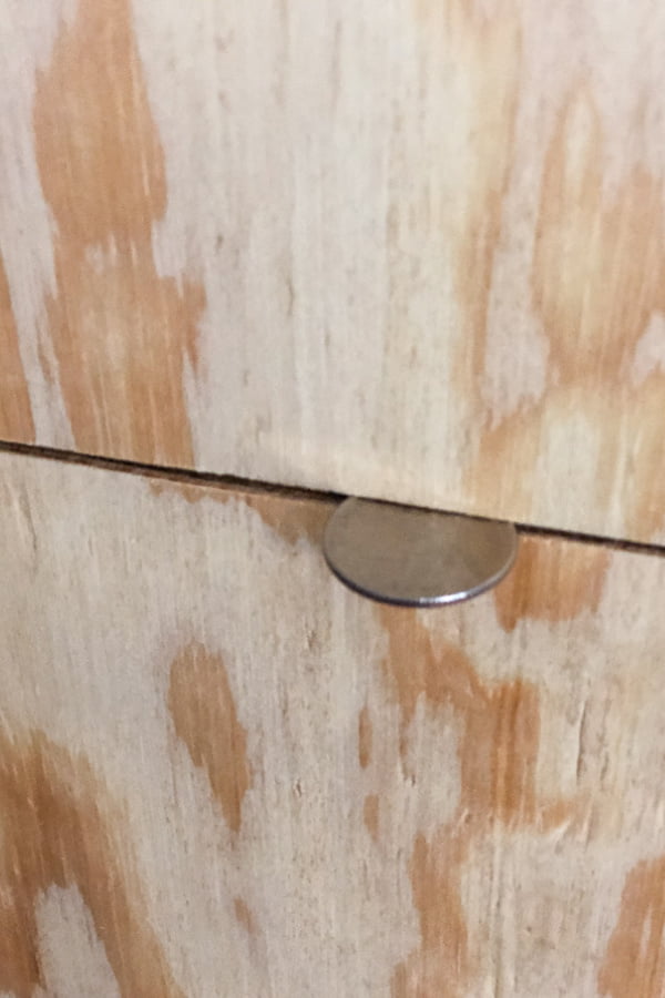 I used a quarter as a spacer for my faux shiplap wall.