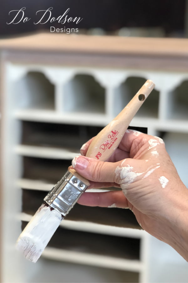 When painting the inside of a vintage desk, you need the right paintbrush for the job.