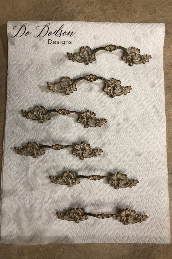 Be sure to clean the old hardware before painting.