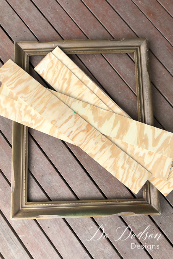 I used plywood to upcyle picture frames to look like faux ship-lap.