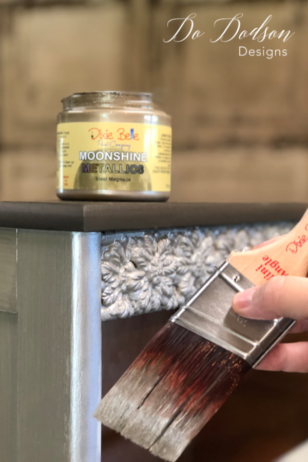 Using a quality synthetic paintbrush is the key to beautiful metallic painted furniture.