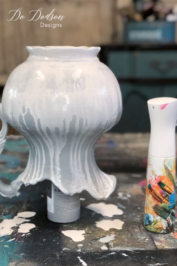 Mist over the painted ceramic pitcher with water to create a drippy effect. This is fun!