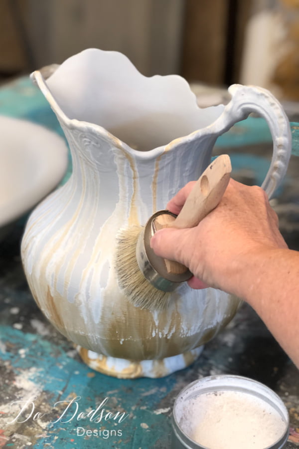 After painting the ceramic pitcher, I sealed it with white wax. What a cool look!