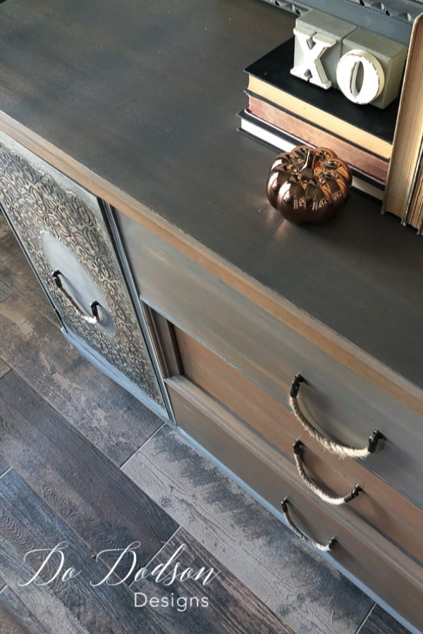 I stained the wood a beautiful weathered gray to compliment the raised stencils. The rope hands are adorable!
