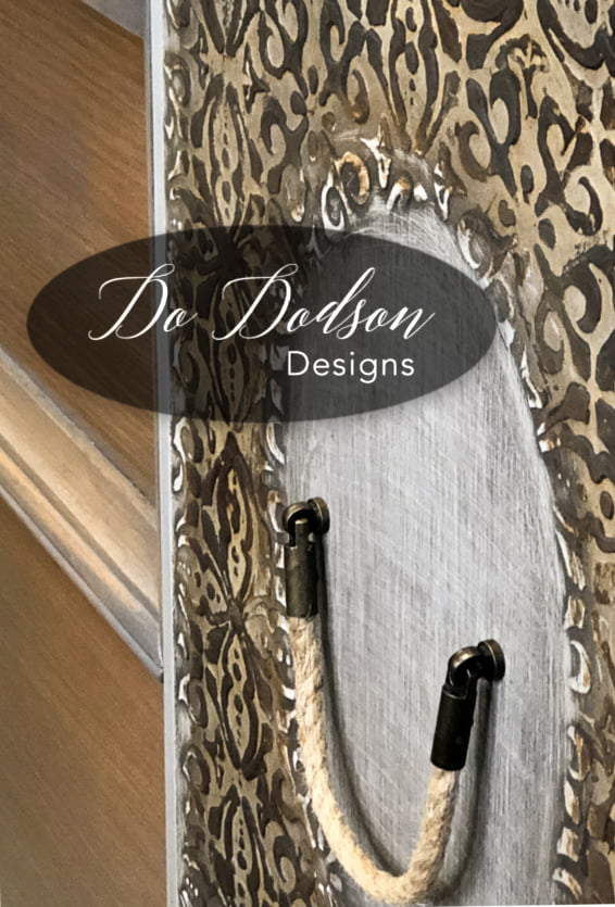 Raised stencils on painted furniture with a rusty patina.