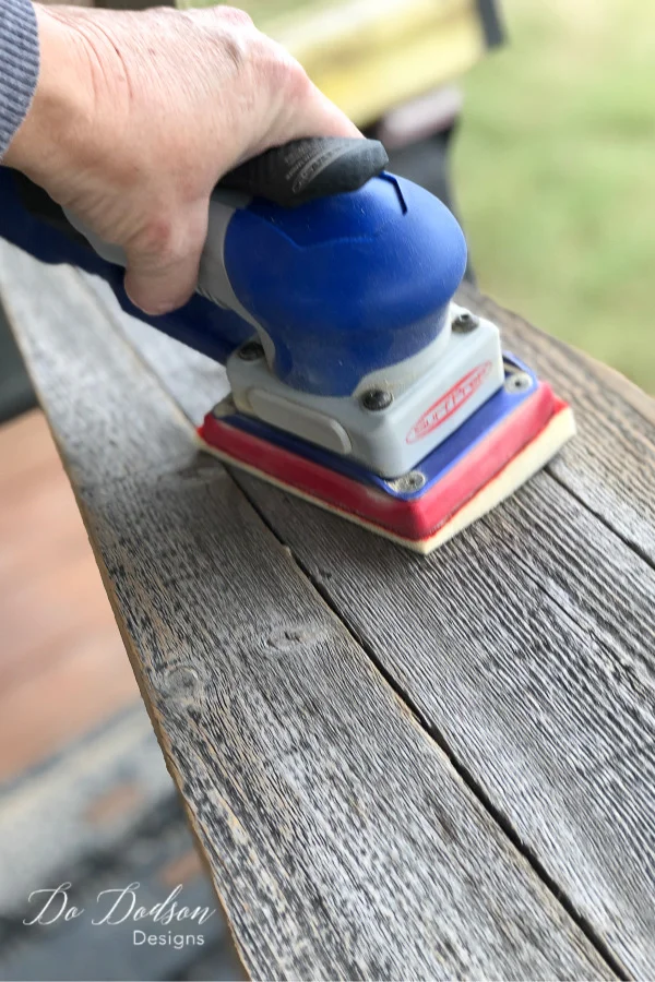 I used my Surfprep sanding system to smooth out the rough edges of the repurposed fence boards before painting.
