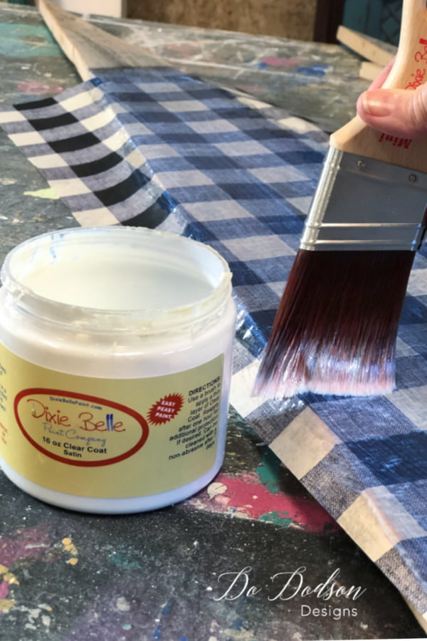 Liberally apply the topcoat over the decoupage tissue paper. I use this instead of Mod Podge. Works great!
