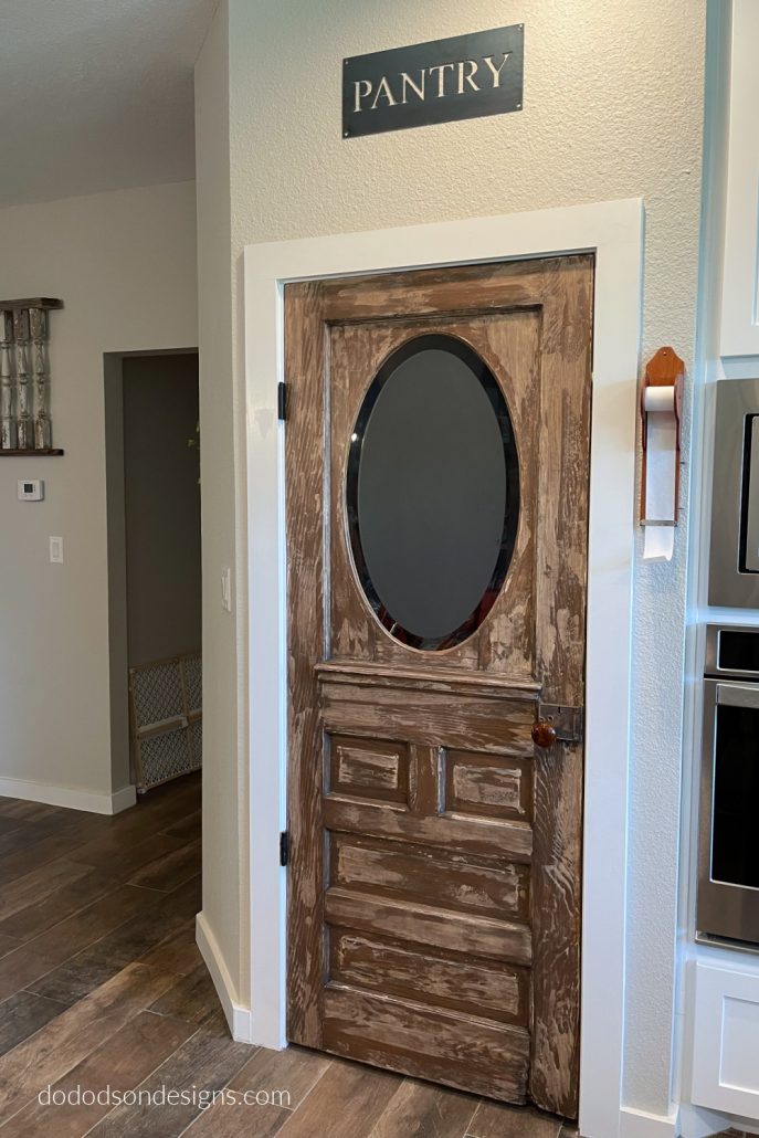 DIY Chippy paint finish on an old pantry door.
