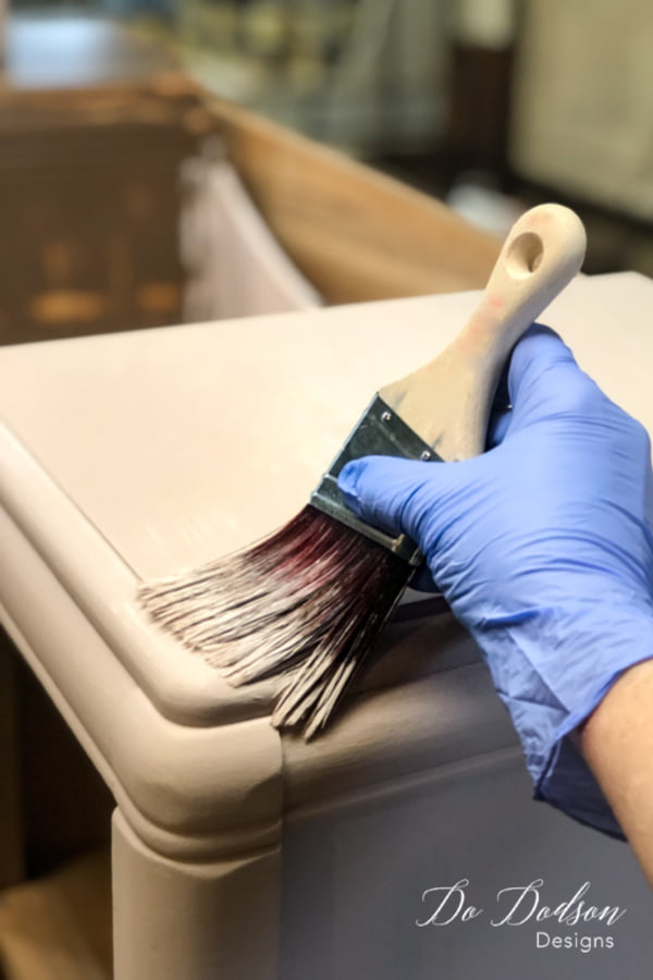 Paint + Paintbrush + Water = how to paint furniture without brush strokes. It sounds like simple math and actually it is. It's all about keeping the paint moving and adding a fine mist of water with your chalk mineral paint to keep it workable.