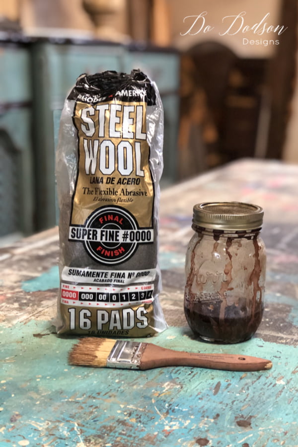First, you will need a glass jar with lid, distilled vinegar, and superfine steel wool. Add one piece of the steel wool into the glass jar (pint size for this project) and fill the jar with the vinegar. The vinegar will eat away the protective coat on the steel wool and result in a beautiful rusty stain for your raw wood.