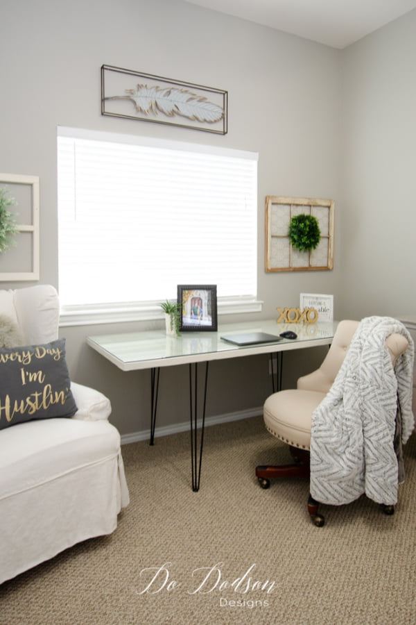 My home office is complete with my easy DIY hairpin leg desk made from an old door. You gotta try this idea!