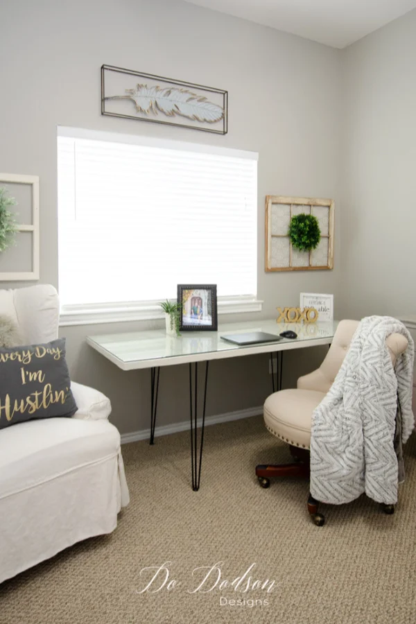 My home office is complete with my easy DIY hairpin leg desk made from an old door. You gotta try this idea!