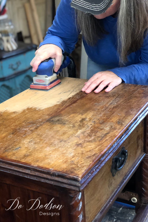 I started this makeover by stripping down to the raw wood to get the look I wanted. Next is the introduction of paint on raw wood for an ombre effect.