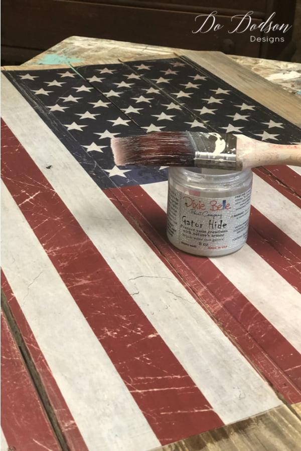 This American glad pallet sign will be on my front porch and exposed to extreme temperatures. Here in Texas, the humidity is always a concern for outdoor decor, so I used Gator Hide a water-proof topcoat to seal it. Use two coats for maximum protection on wood and painted surfaces.