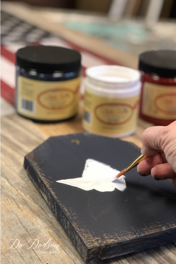 I hand painted these wooden tags. These will be the perfect addition to my DIY American flag pallet sign.