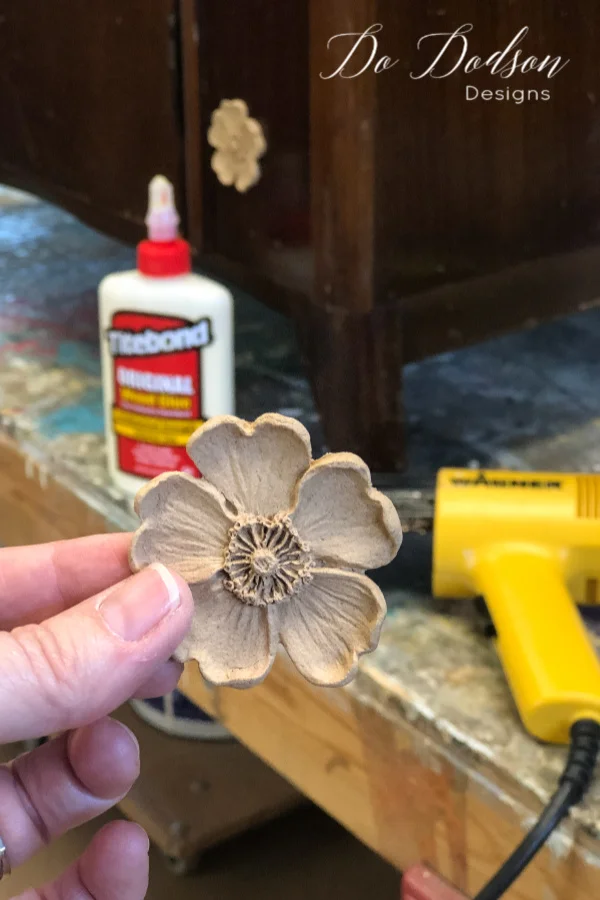 Here is a fun way to add beautiful details without a lot of hassle. It's called WoodUbend. These little nuggets are made from compressed sawdust and molded into amazing appliques that bend when heated up to conform to the surface area when applied with wood glue.