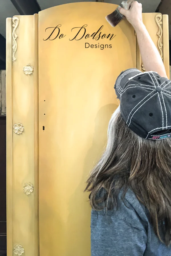 As your blended chalk paint begins to dry, try using a clean dry brush and softly blend any fine lines that may have occurred during the blending while using a paper towel to clean the brush periodically to prevent the colors from mixing. Blending chalk paint on furniture can be learned with a little practice and patience.