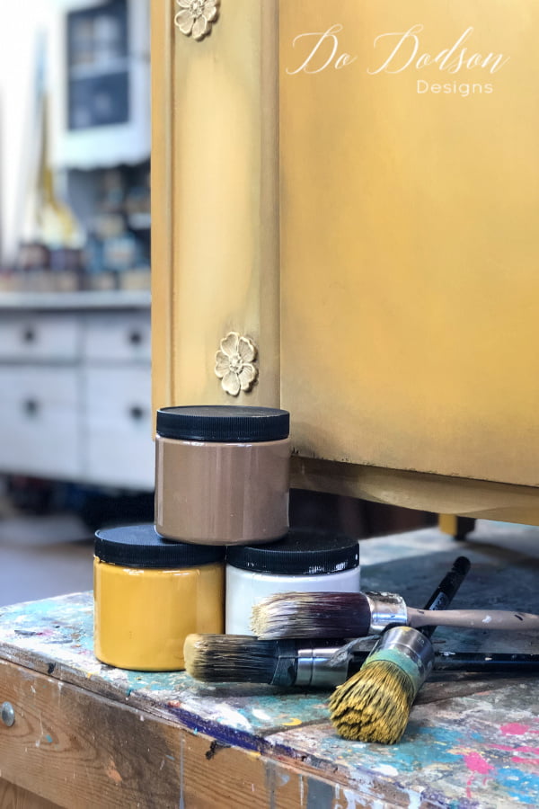 Chose 2-3 colors that are complementary to each other. For example... for this piece I chose Colonel Mustard (yellow), Pine Cone (brown), and Butter Cream (off white). Blending chalk paint is much easier when the colors are cohesive. One-color blends into the other creating a third color and you can really create some amazing finishes when colors collide.