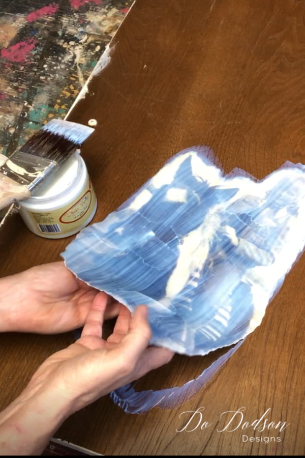 For a rustic edge on the photo transfer, try tearing around the image before applying it. Of course, you can transfer the whole image if you want to... just be sure to trim it to fit before applying the transfer (clear coat) medium. For this project, I am using Dixie Belle's Clear Coat as my transfer medium.