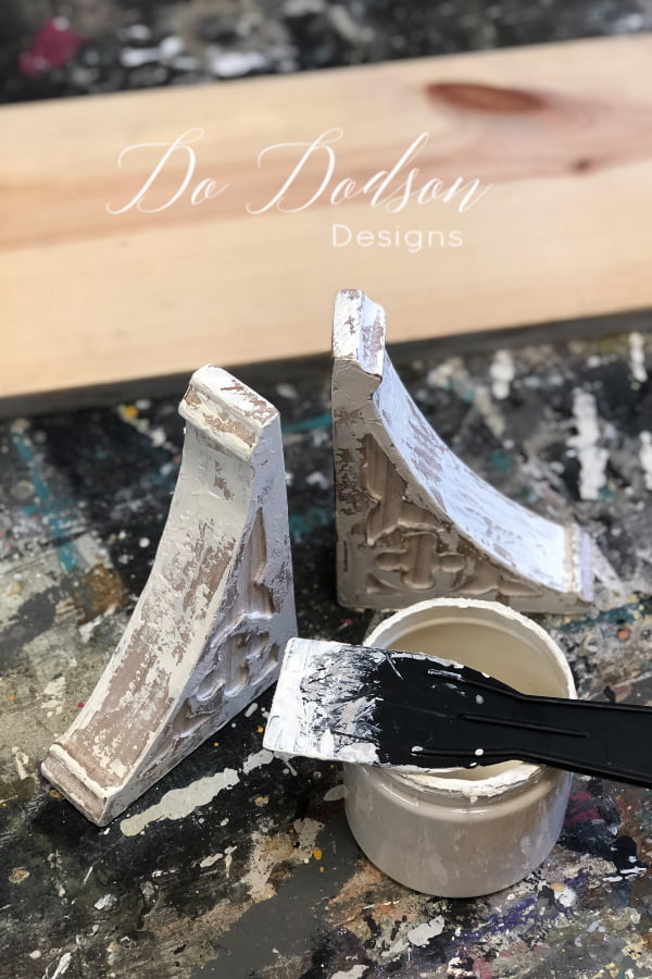 To create a chippy textured look, I used a spatula to drag Buttercream Chalk Mineral Paint (a beautiful vintage color) across the wood. Also dabbing the paint to create texture. Allow this to dry thoroughly. After it's dried, go back with Black Wax with a wax brush and lightly add some more aged goodness.