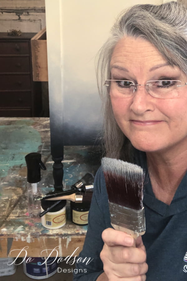 Since your giving your old furniture a makeover, why not set the background for the transfer that you want to apply. Try adding a soft blended paint look that compliments the transfer.