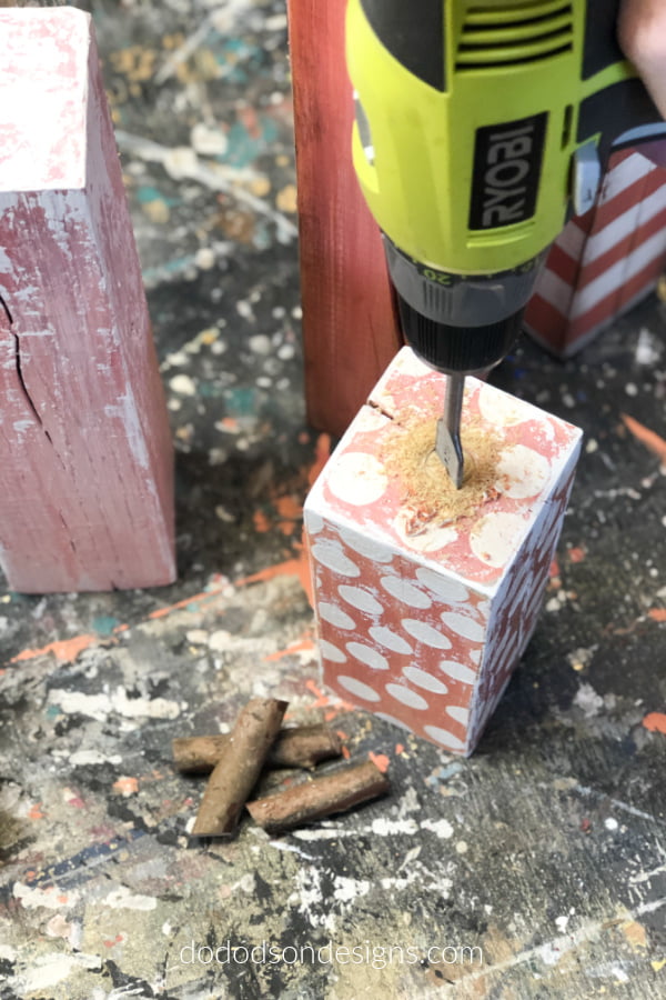 I drilled holes in the tops to attach the stem for my wooden pumpkins.