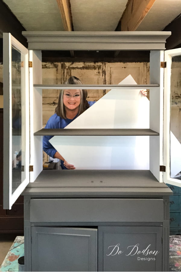 PRO TIP... remove the backer board of a hutch before painting. It makes painting the inside much easier!