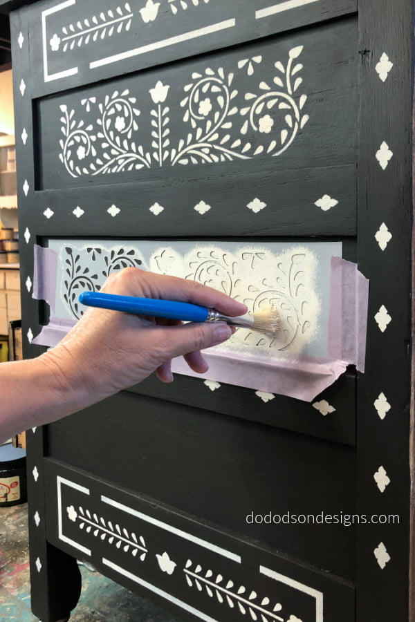 Tap, tap, tap with your stencil brush... Never paint back and forth over your stencil. This will result in bleeding under the stencil.